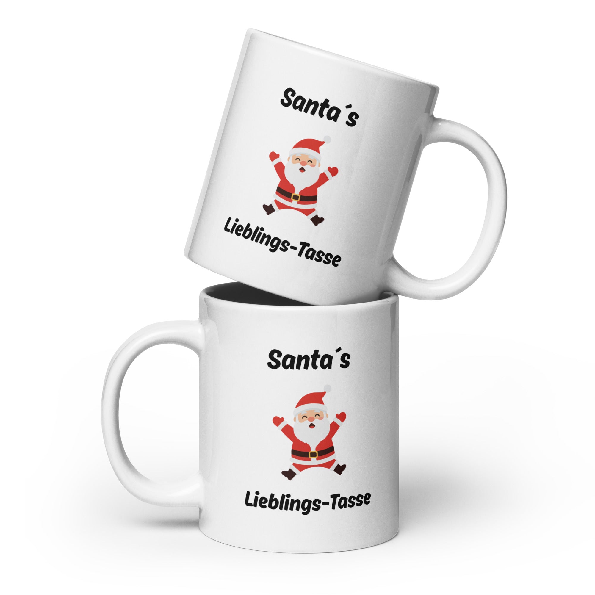 Weiße Tasse mit dem Spruch "Santa´s Lieblingstasse" und einem Bild eines springenden, fröhlichen Weihnachtsmann in der Mitte
